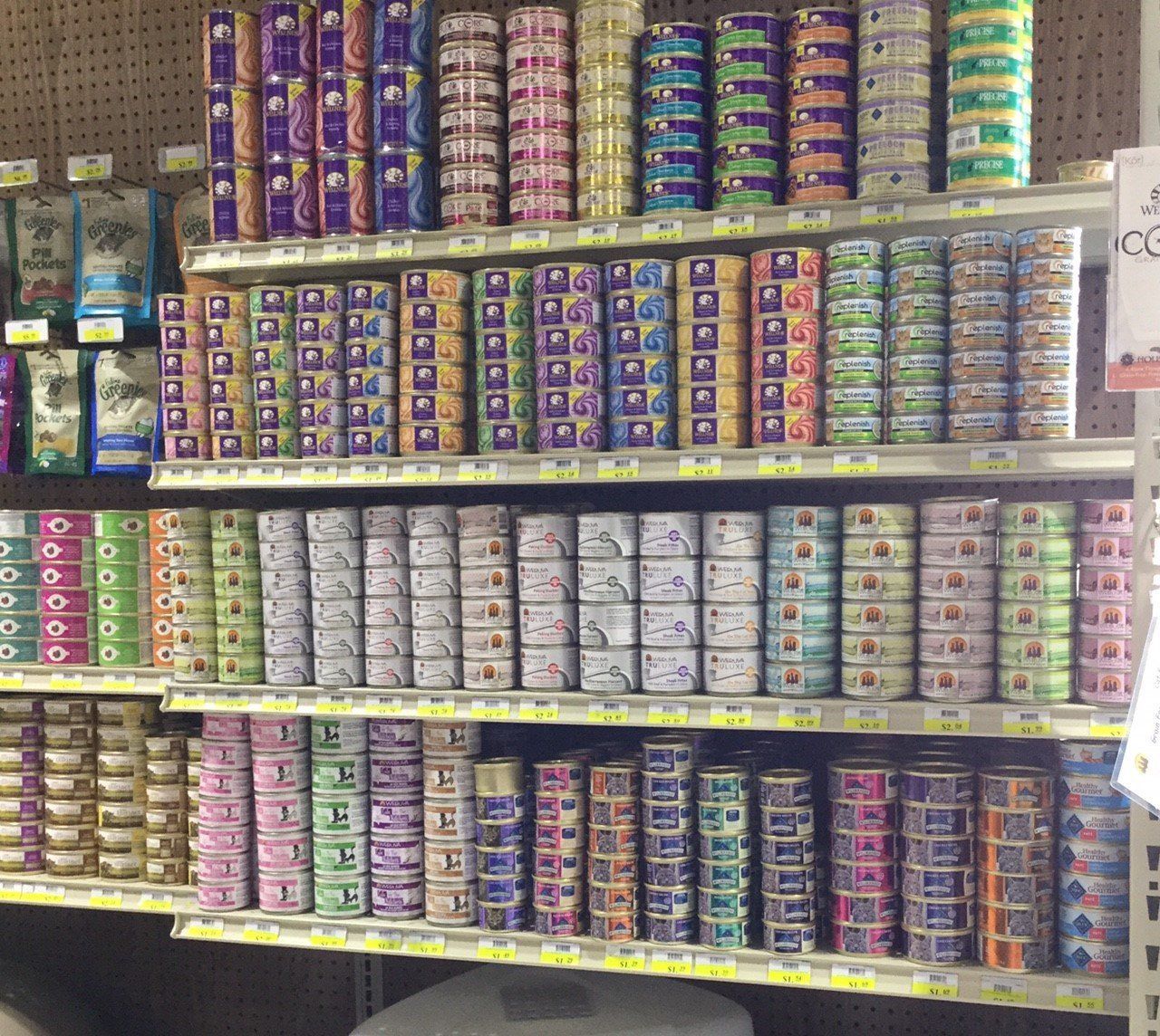 All types of wet canned animal feed for cats.