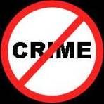 A no crime sign with a cross through it.