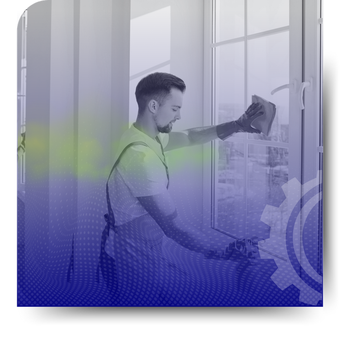 A man cleaning a window