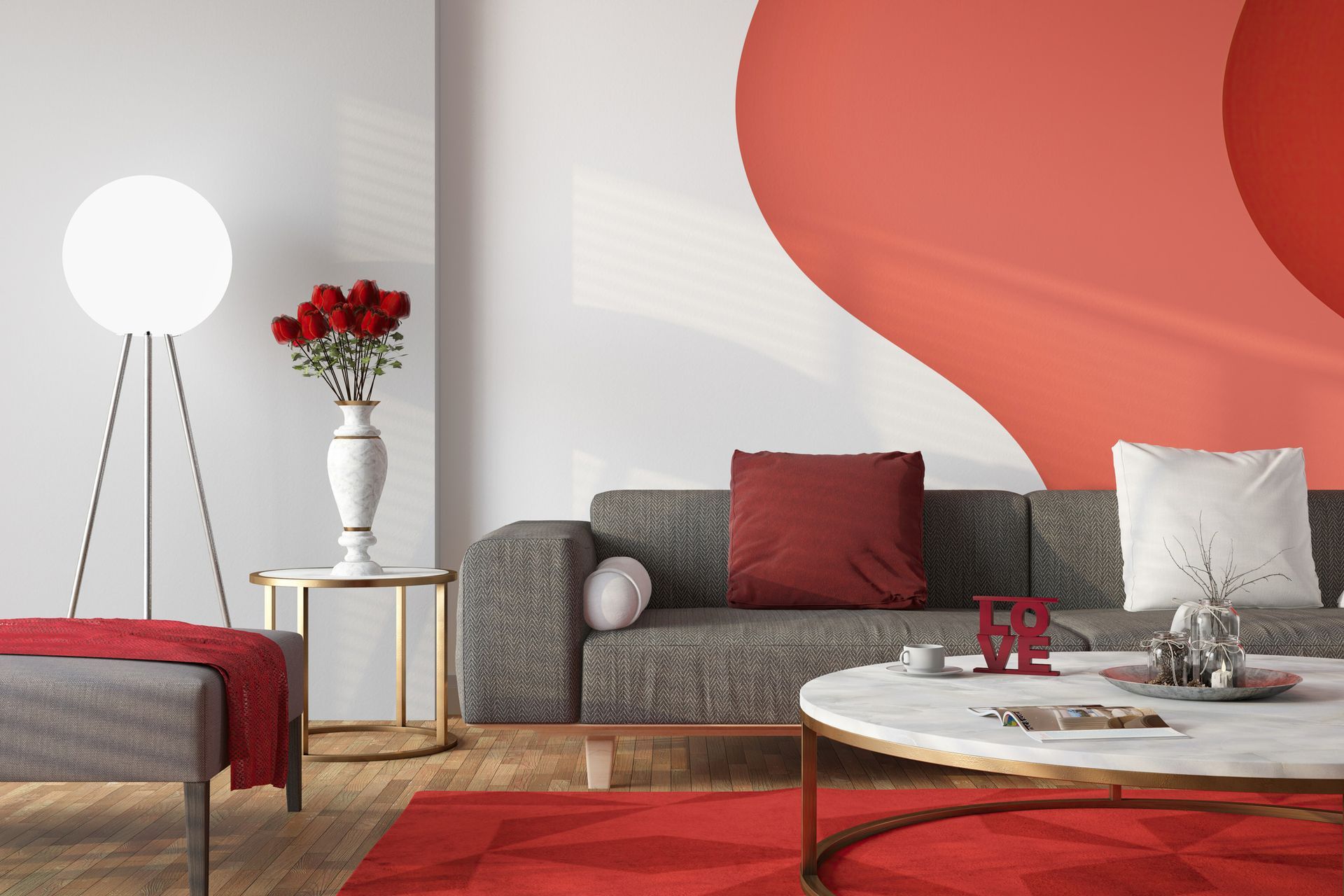 A living room with a couch , coffee table , vase of flowers and a red rug.