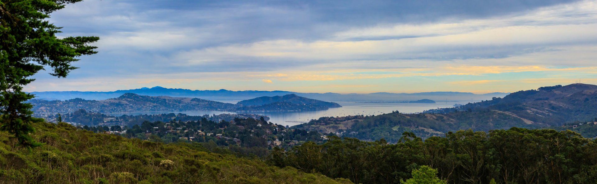 Fog and clouds rolling in around sunset at San Francisco Bay above Sausalito in California USA