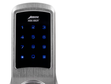 A close up of a digital door lock with a keypad on a white background.