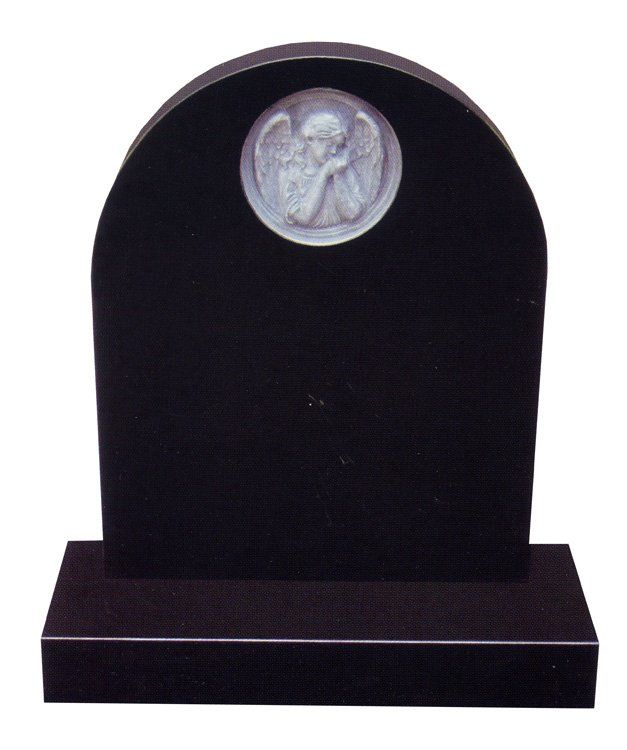 Headstone carved