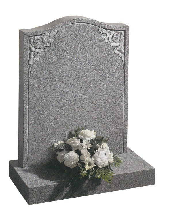 Headstone carved