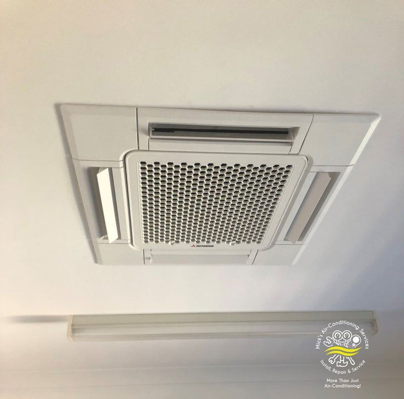 A Modern Commercial Air Conditioner Ceiling Vent — Mick’s Air-Conditioning Services in Gracemere, QLD
