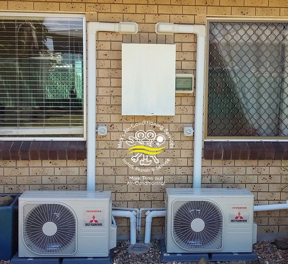 Two Mitsubishi Air Conditioner Inverters — Mick’s Air-Conditioning Services in Gracemere, QLD