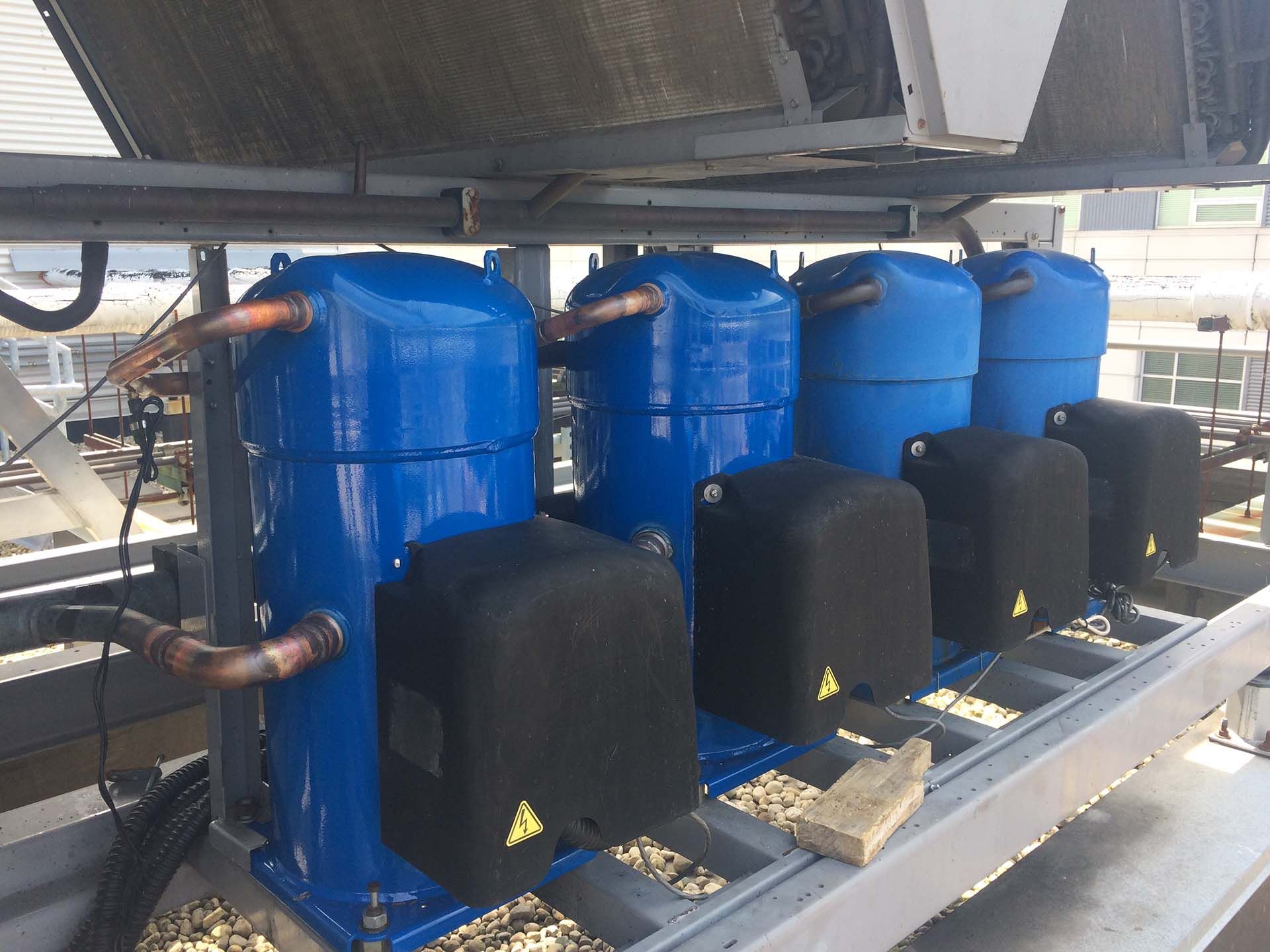 Blue rooftop air conditioning units.