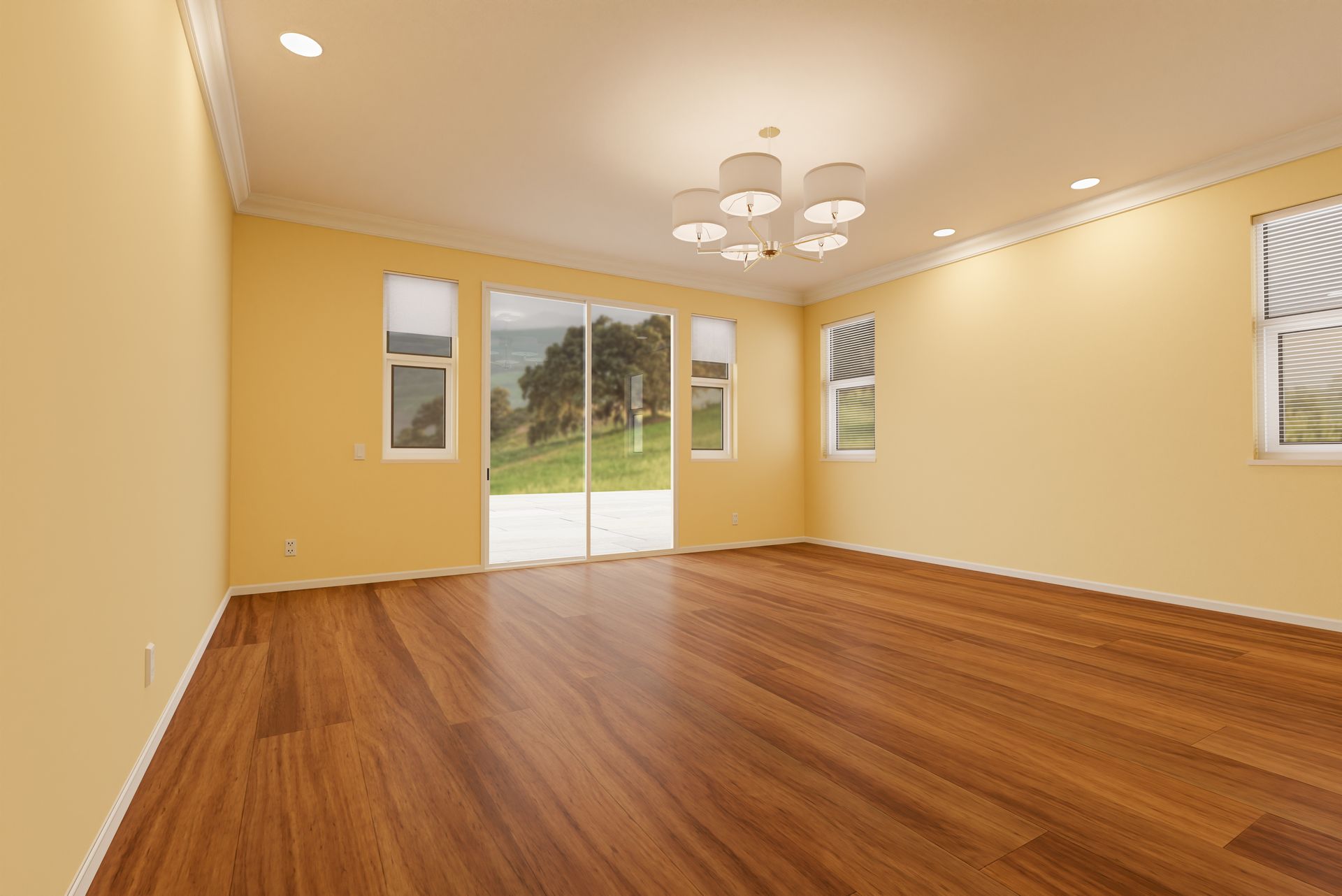 Empty room with hardwood floors, yellow walls, and a view of a green outdoor area through sliding glass doors.