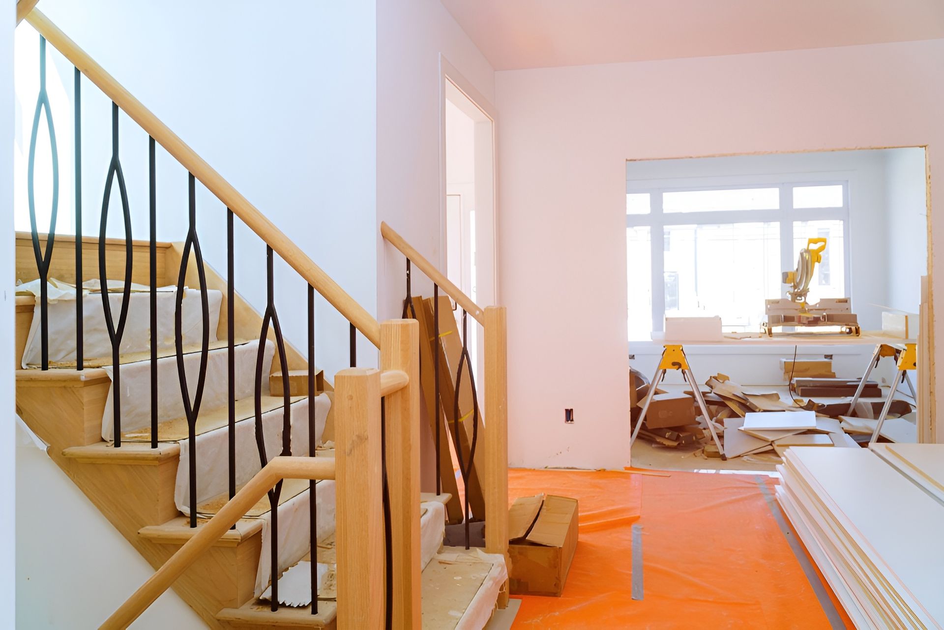Bright Room with A Staircase and Orange Floor Covering Under Renovation — WJG Built in Wollongbar, NSW