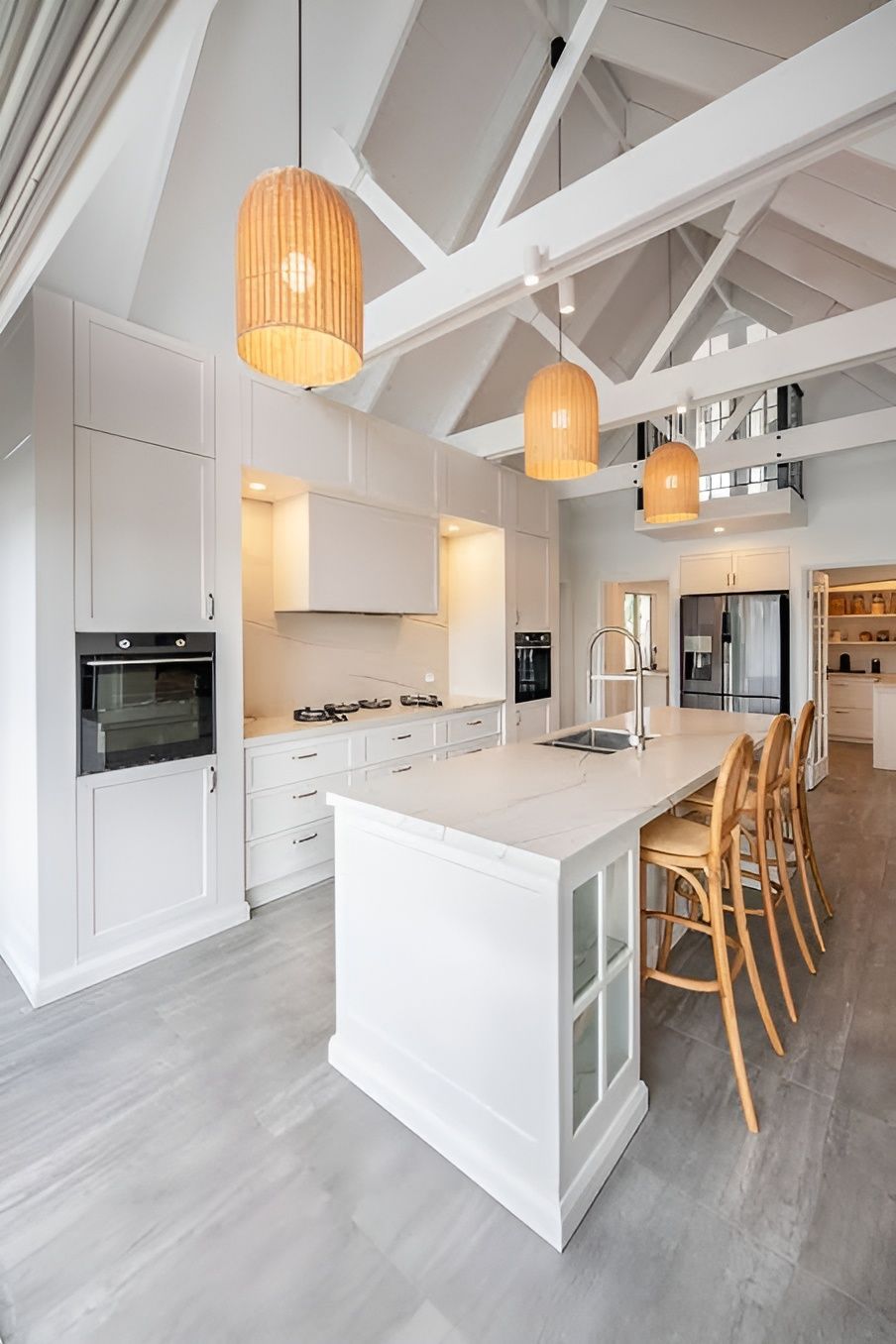 Bright Modern Kitchen with Wood Bar Stools and Hanging Pendant Lights — WJG Built in Wollongbar, NSW