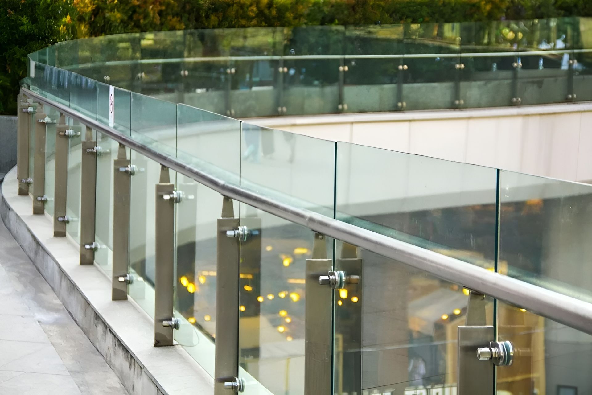 Glass Railed Outdoor Staircase with Metal Posts Beside a Tree Lined Walkway — WJG Built in Wollongbar, NSW