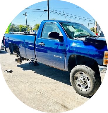A blue truck is parked on the side of the road |  Cordova Auto Center #4