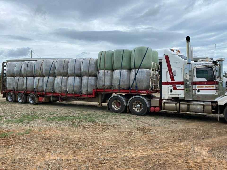 A Semi Truck With Persony Large Round Objects on the Back — Reliable Machinery Transport in Mareeba, QLD