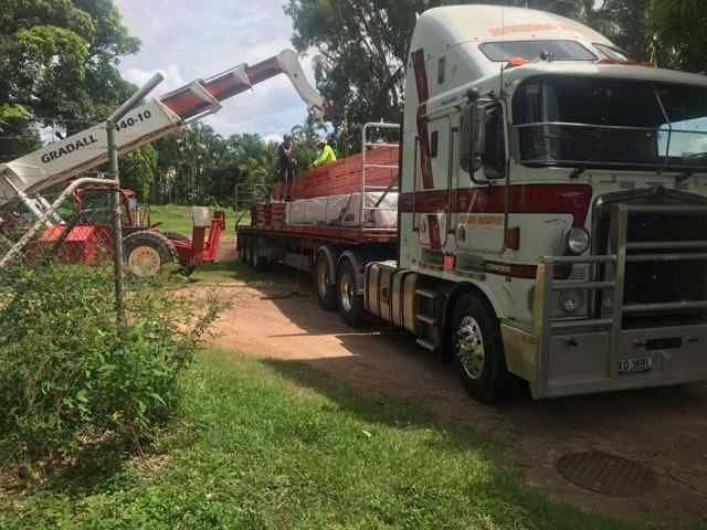 A Truck With a Crane on the Back