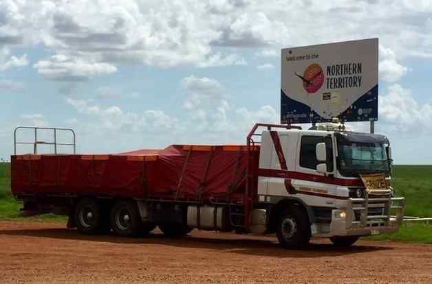 A Truck on a Dirt Road — Reliable Machinery Transport in Mareeba, QLD