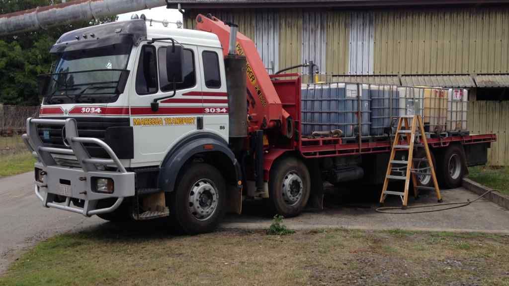 A Truck With a Ladder and a Ladder — Container, Machinery & General Freight Transport in Normanton, QLD