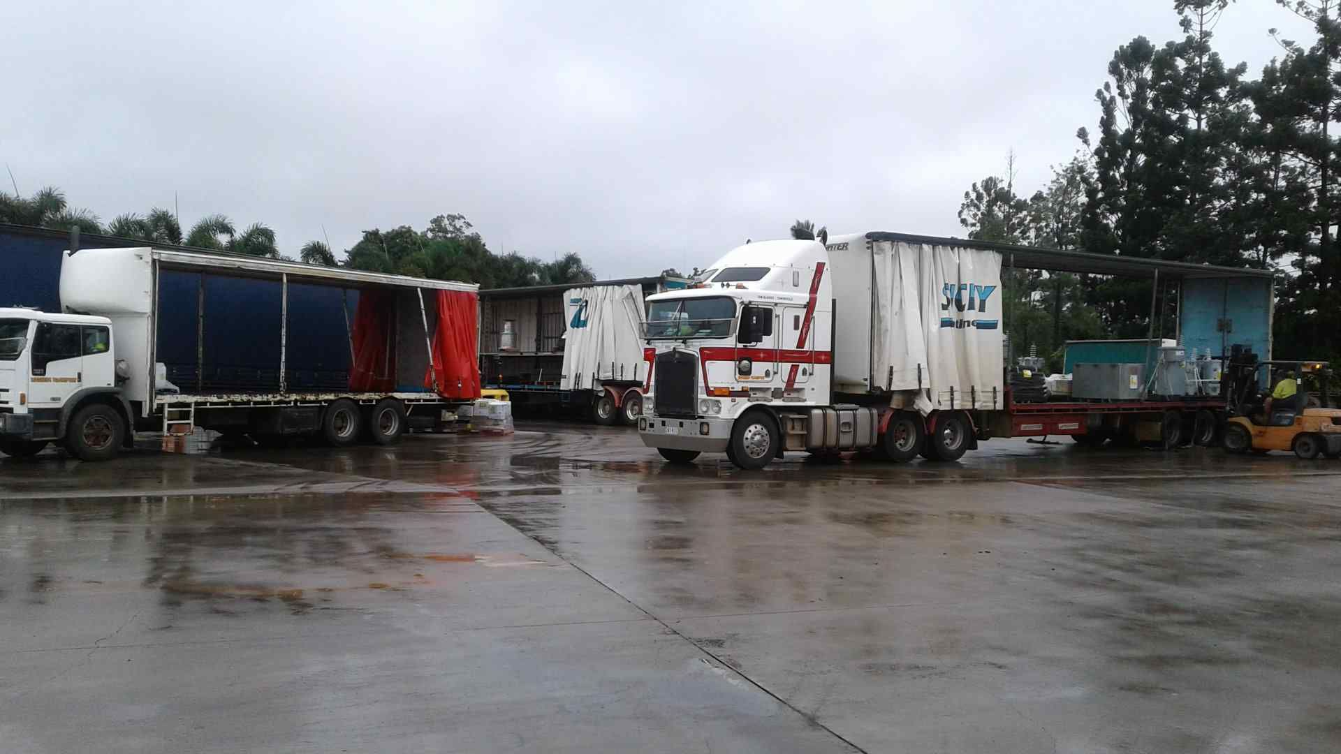 A Truck Parked on a Wet Lot — Taking Care of Freight in Mareeba, QLD