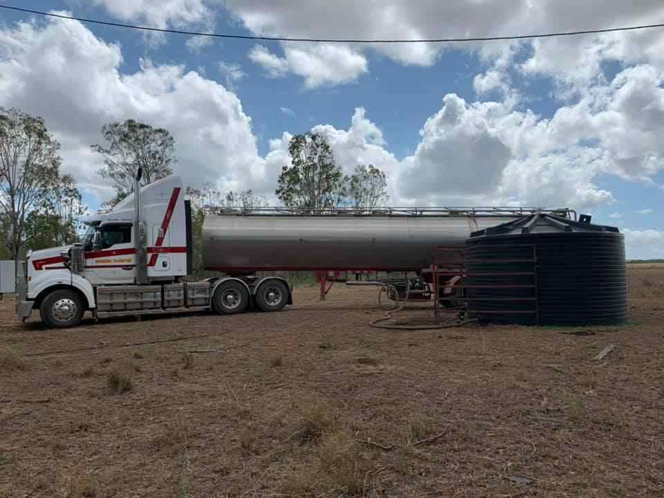 A Truck With a Tank on the Trailer — Container, Machinery & General Freight Transport in Cairns, QLD