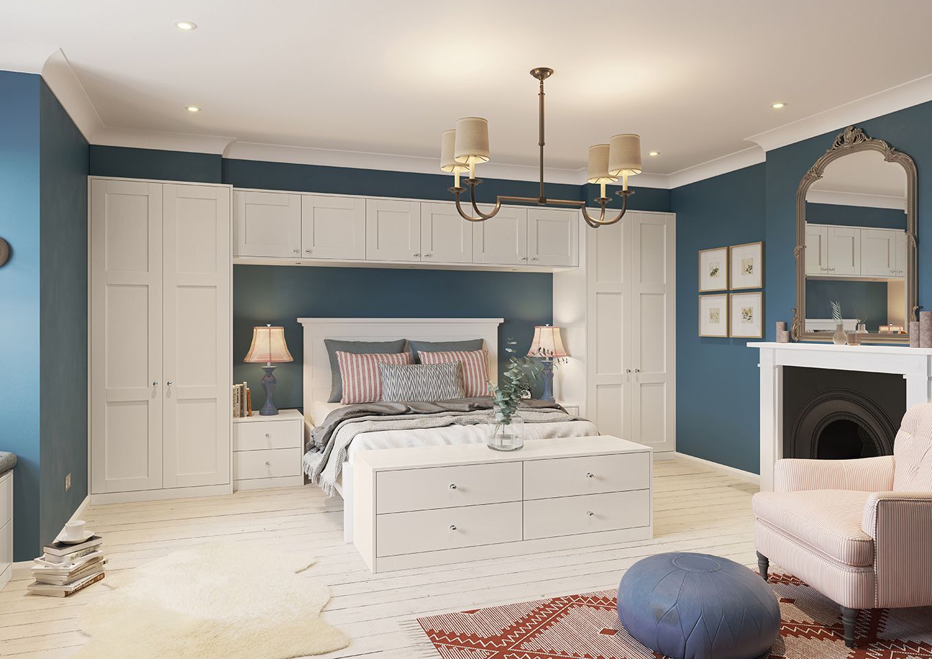 A bedroom with a bed , chair , mirror and fireplace.