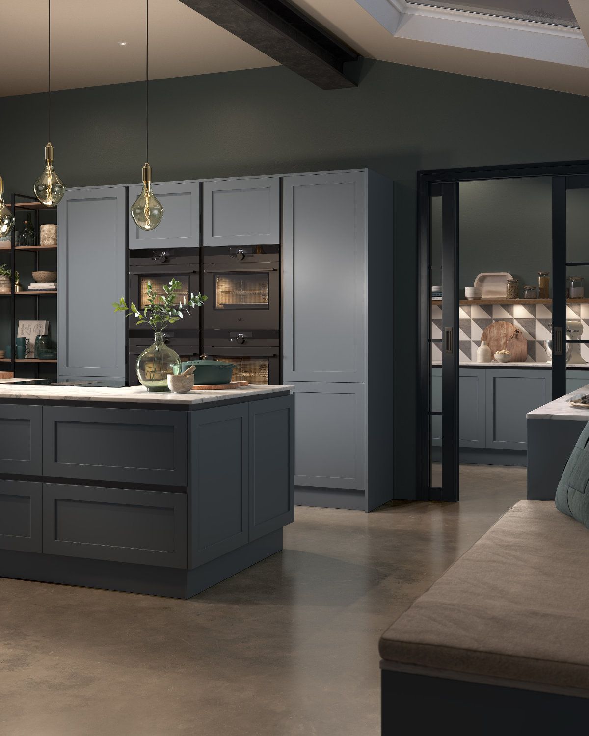 A kitchen with a large island in the middle