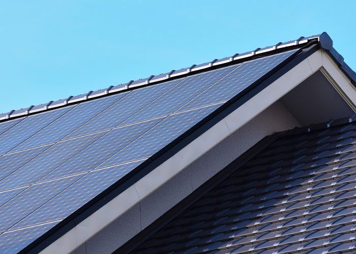Solar Panels Fitted on Modern House Roof — Townsville, QLD — Lonestar Power