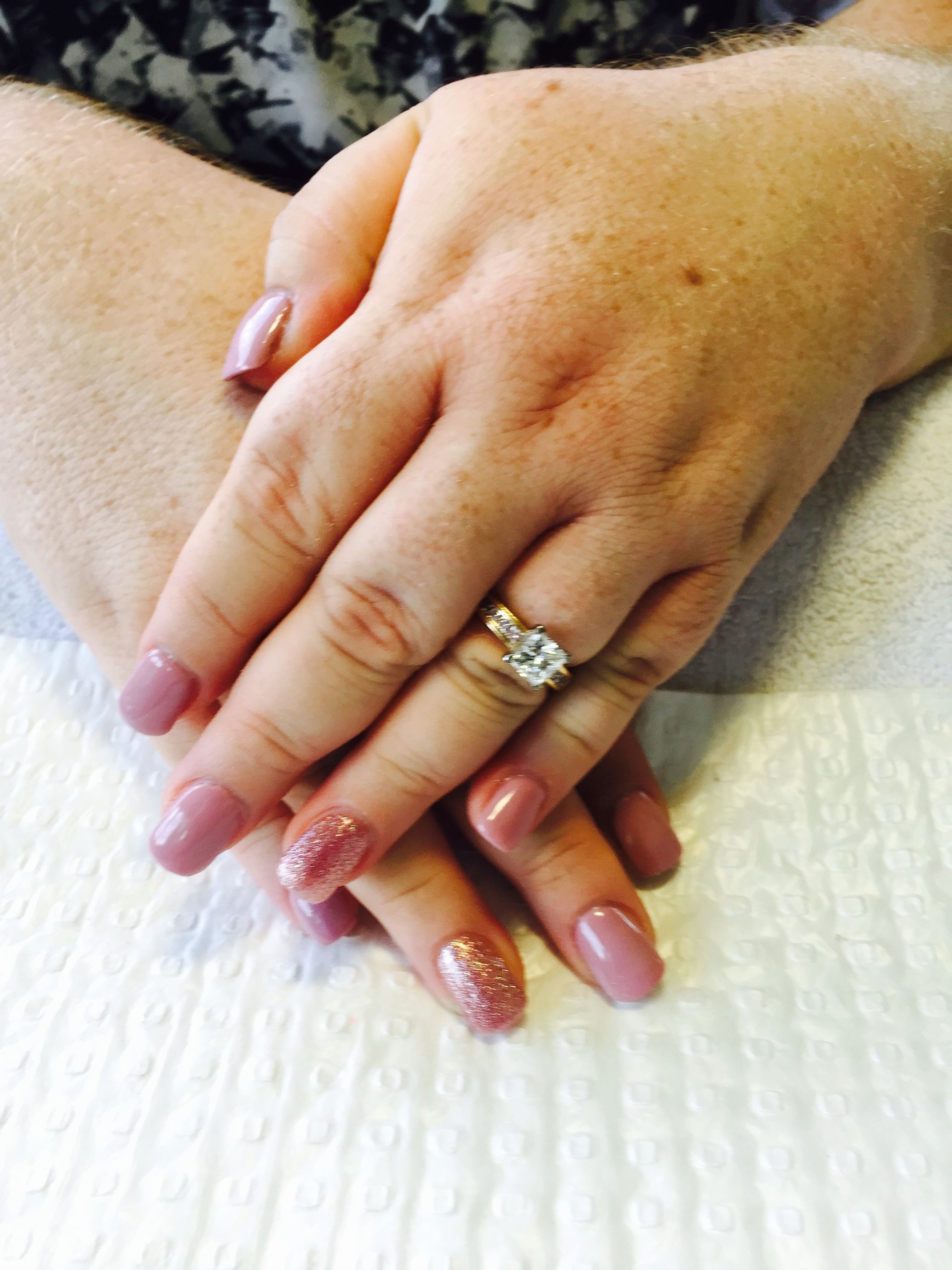 A woman's hands with pink nails and with a ring — Nailz By Dezign In Proserpine, QLD