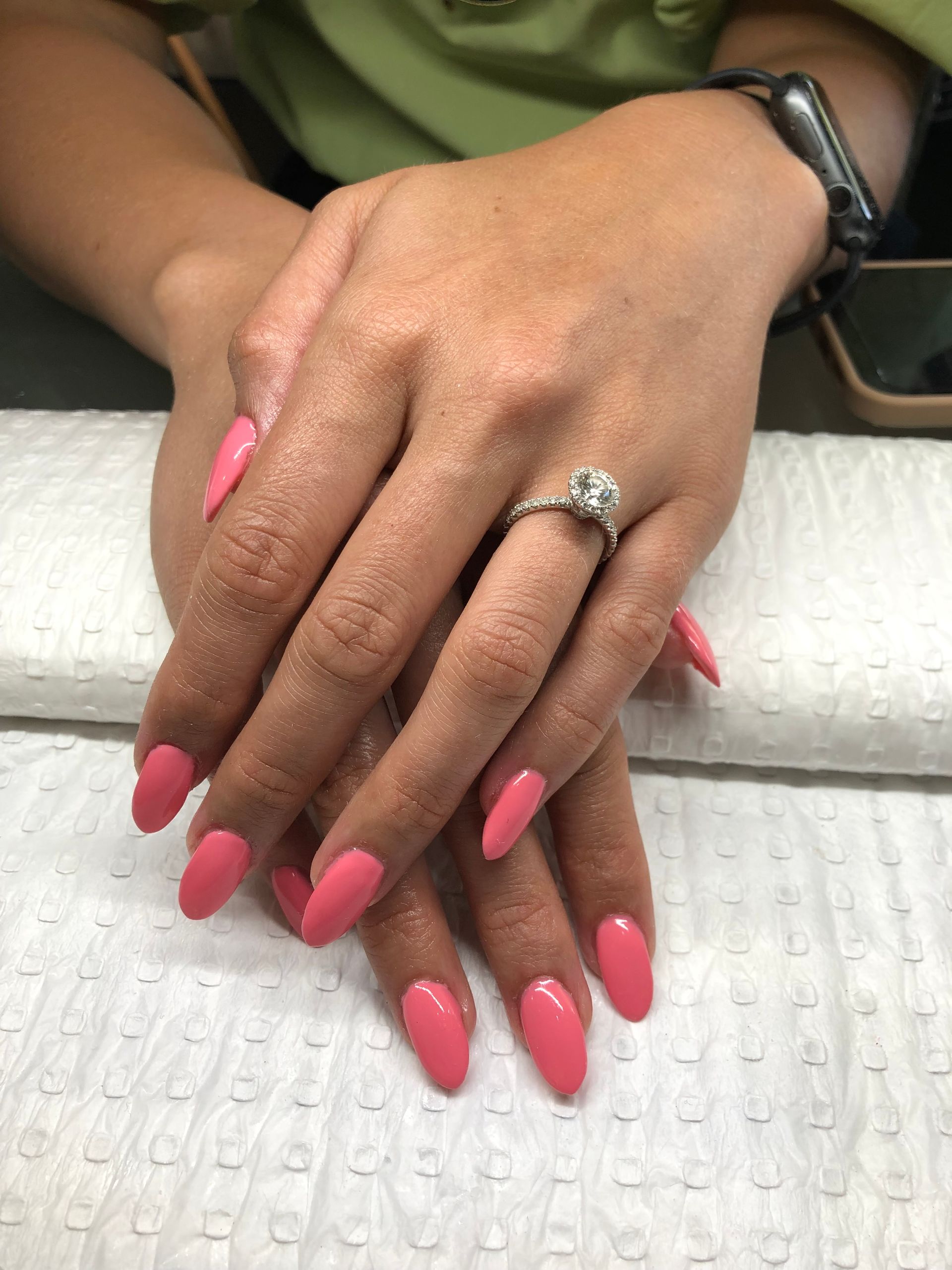A woman with pink nails and a ring on her finger — Nailz By Dezign In Proserpine, QLD