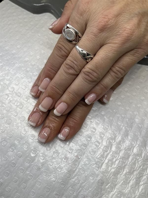 A close up of a woman's hand with a ring on her finger — Nailz By Dezign In Proserpine, QLD