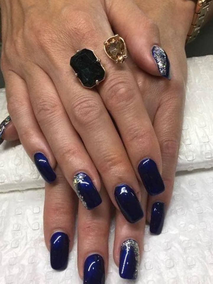 A Woman's Hands With Blue Nails and a Watch on Her Wrist — Nailz By Dezign In Airlie Beach, QLD