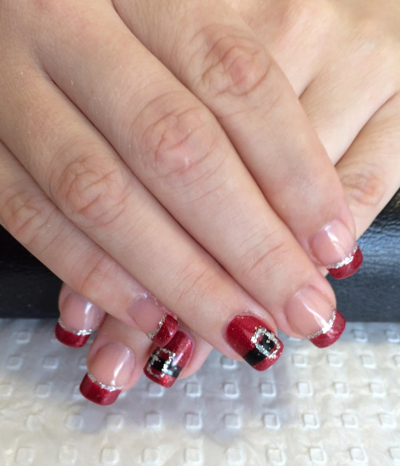 A Close Up of a Woman's Nails With a Santa Claus Design — Nailz By Dezign In Airlie Beach, QLD