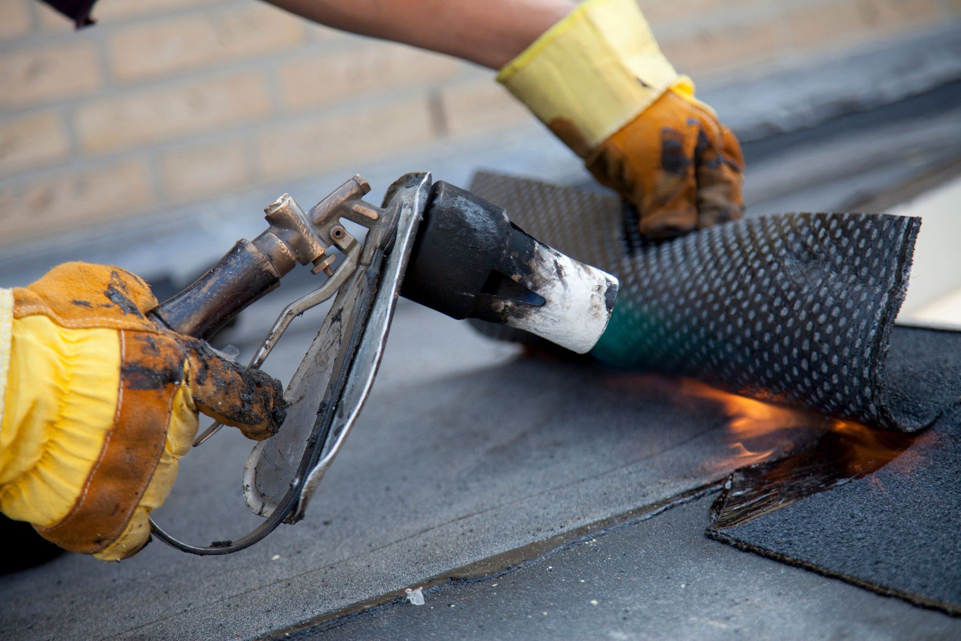 Man Working On The Roof | Mansfield, MA | Peak Roofing