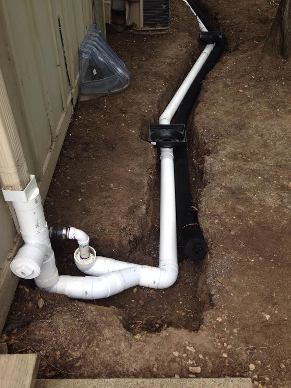 Downspout Water Diverted Service — Kansas City, MO — Atlantis Drainage Solutions