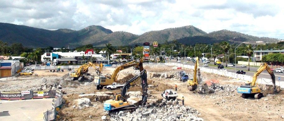A pile of rubble and metal is sitting on the ground.
