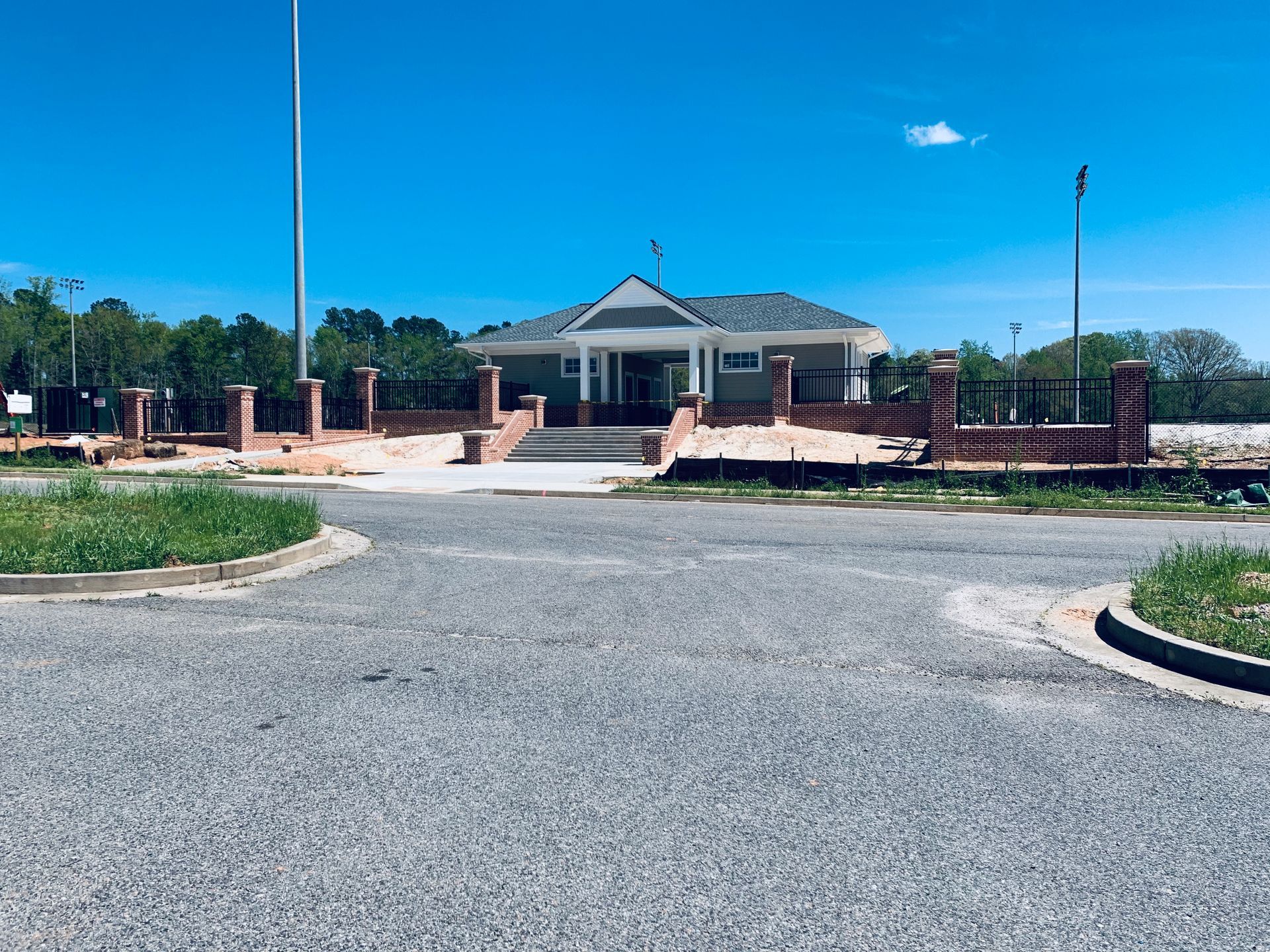 A house with a flag pole in front of it