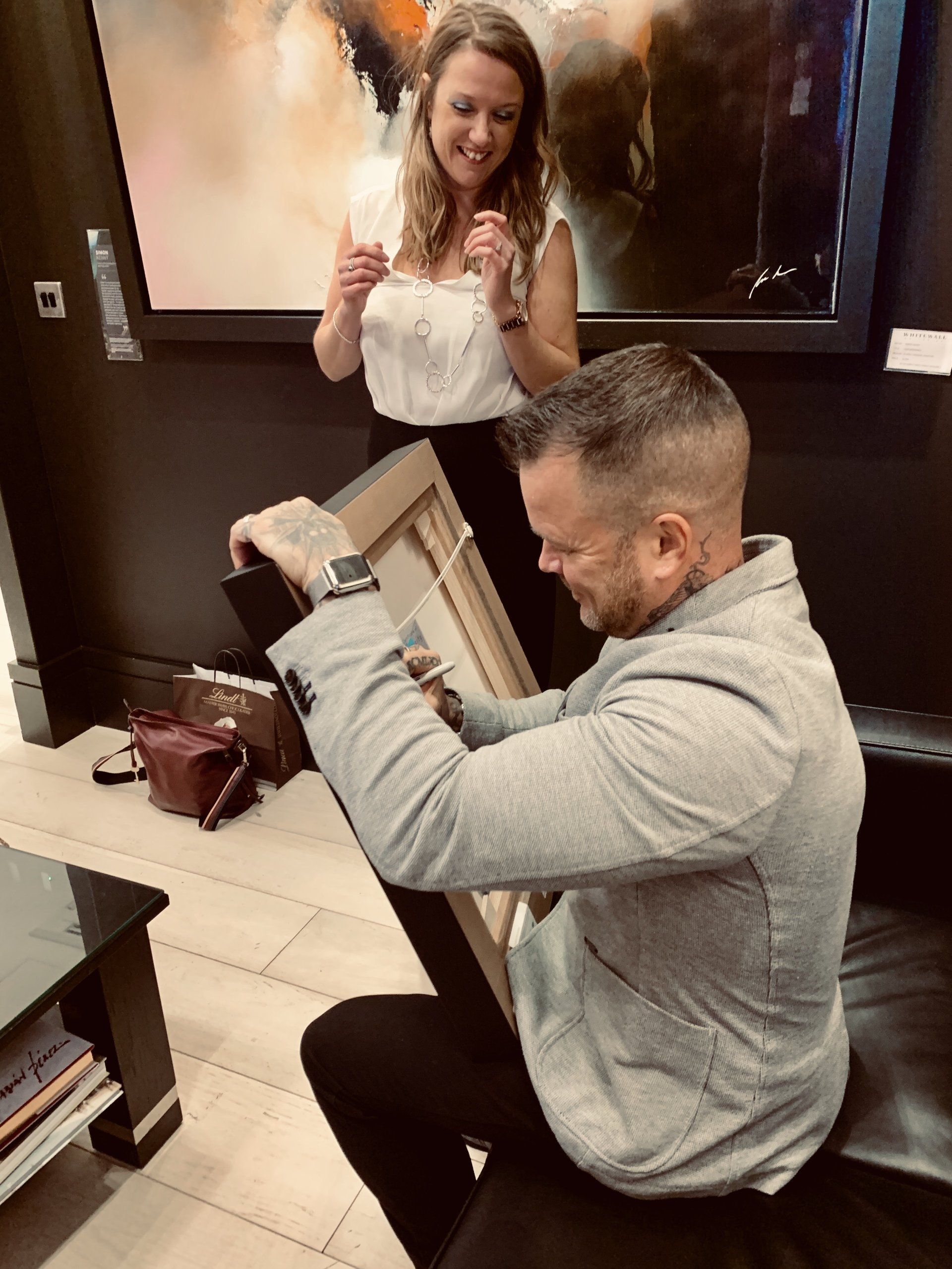 Simon Kenny signing original artwork 
