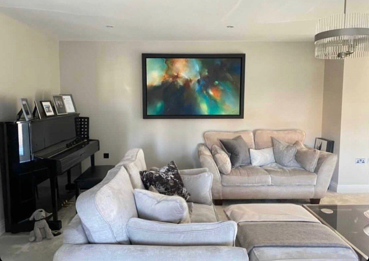 Simon Kenny's art hanging on walls
