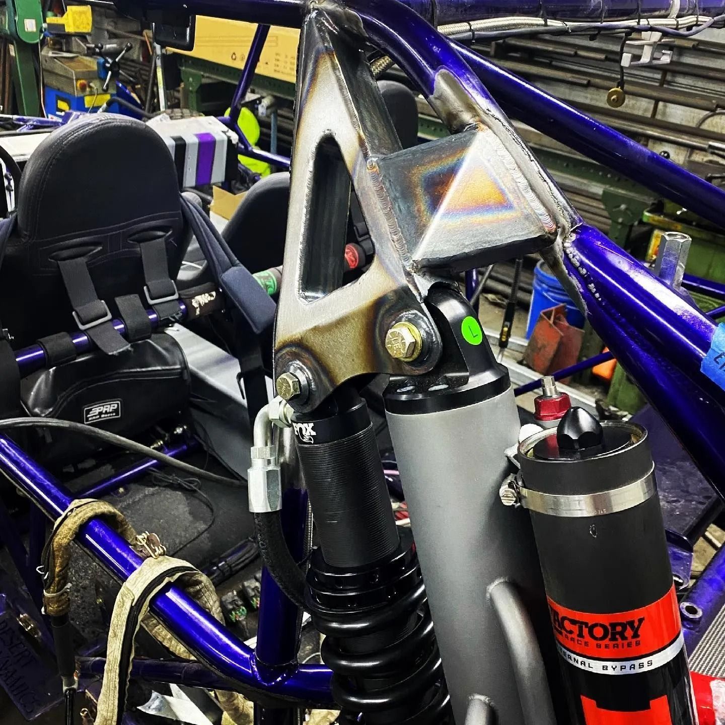 A close up of a victory shock on a vehicle
