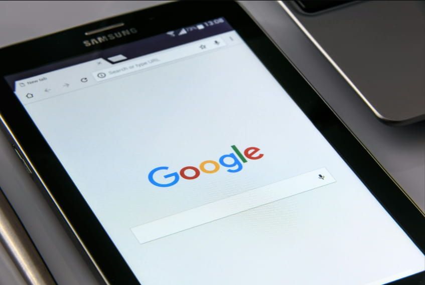 A samsung tablet is open to a google search page.