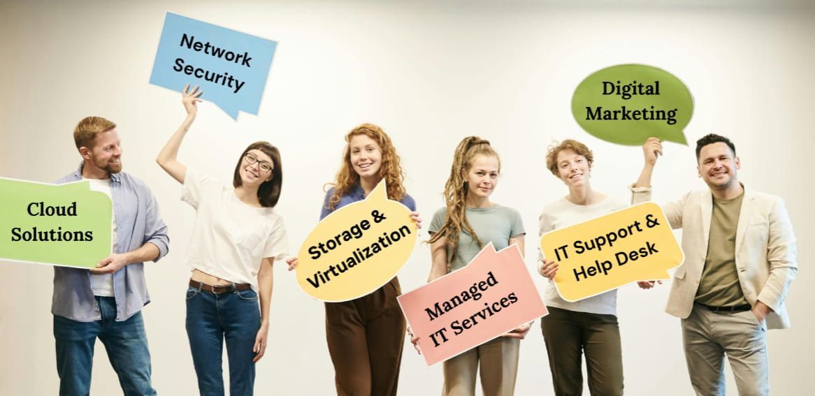 A group of people are standing next to each other holding signs.