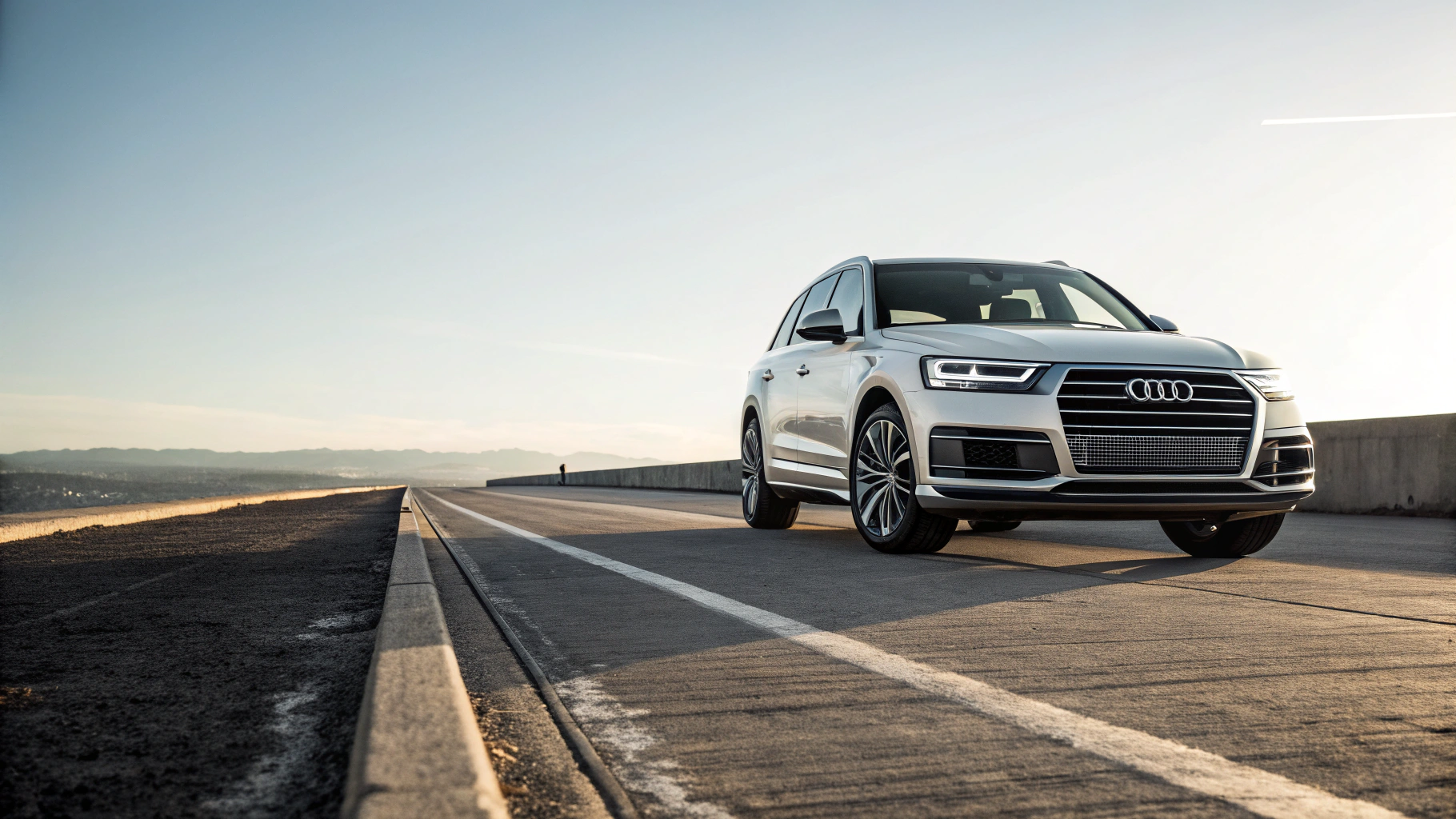 Mid-century modern credenza with a lamp and decorative objects, in a sunlit room.