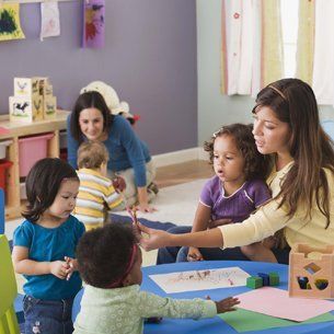childcare staff with children