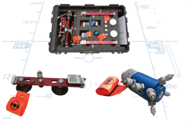 A bunch of electronics including one that says dms on it