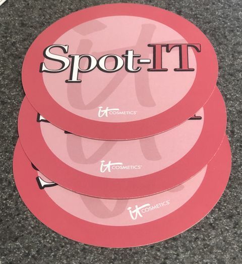 Three pink circles with the word spot-it on them