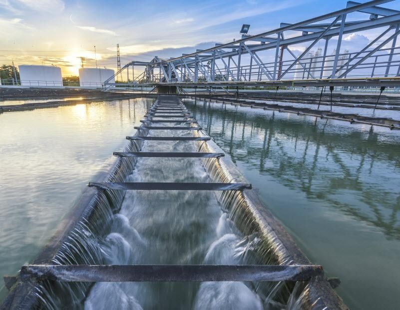 Water is Flowing Through a Pipe in a Water Treatment Plant — CWD Group in Springwood, QLD