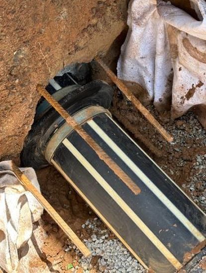 A White Vacuum Truck is Parked on the Side of the Road — CWD Group in Springwood, QLD