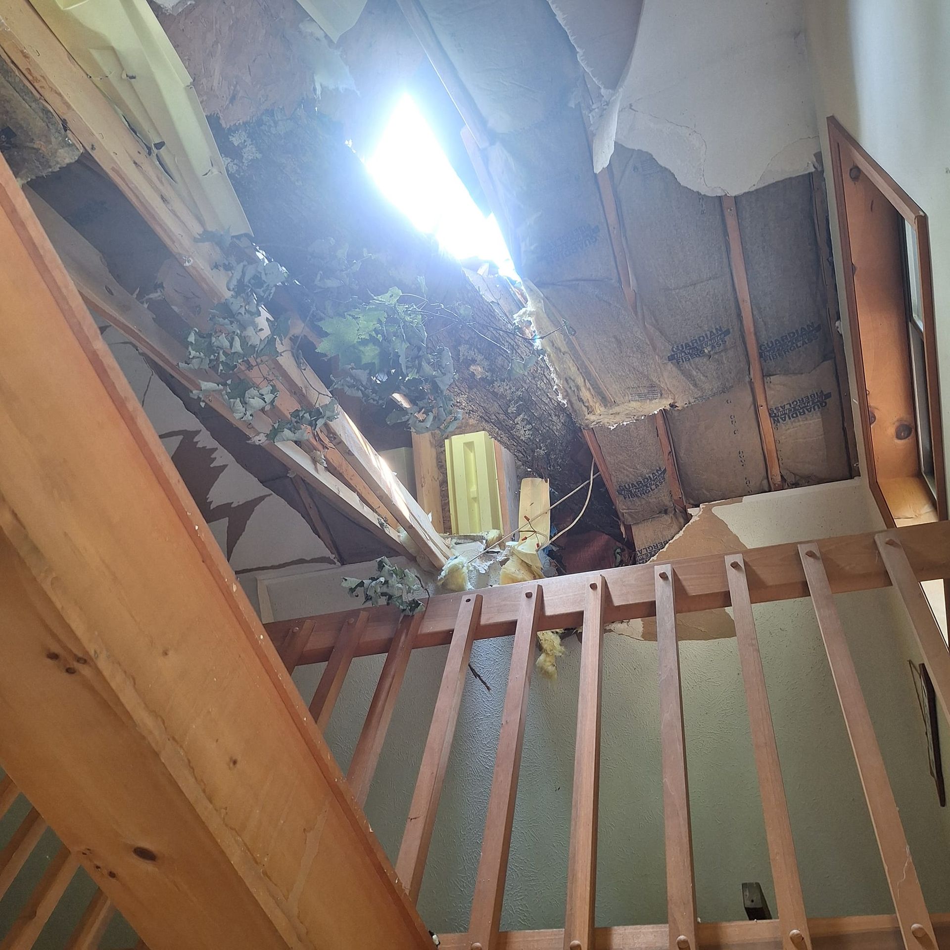 Looking up at the ceiling of a house from the stairs