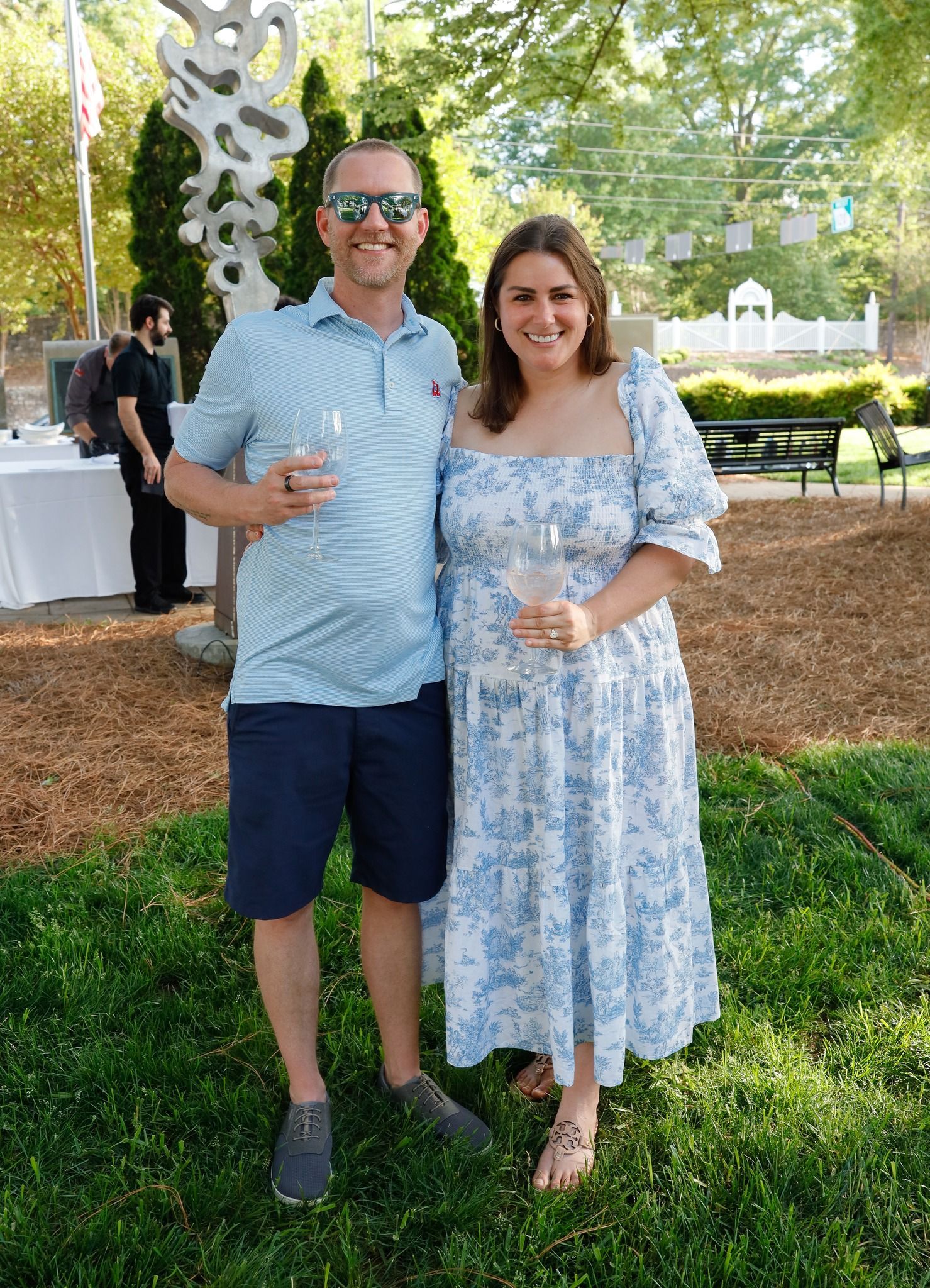 A close up of a plate of food on a wooden table.