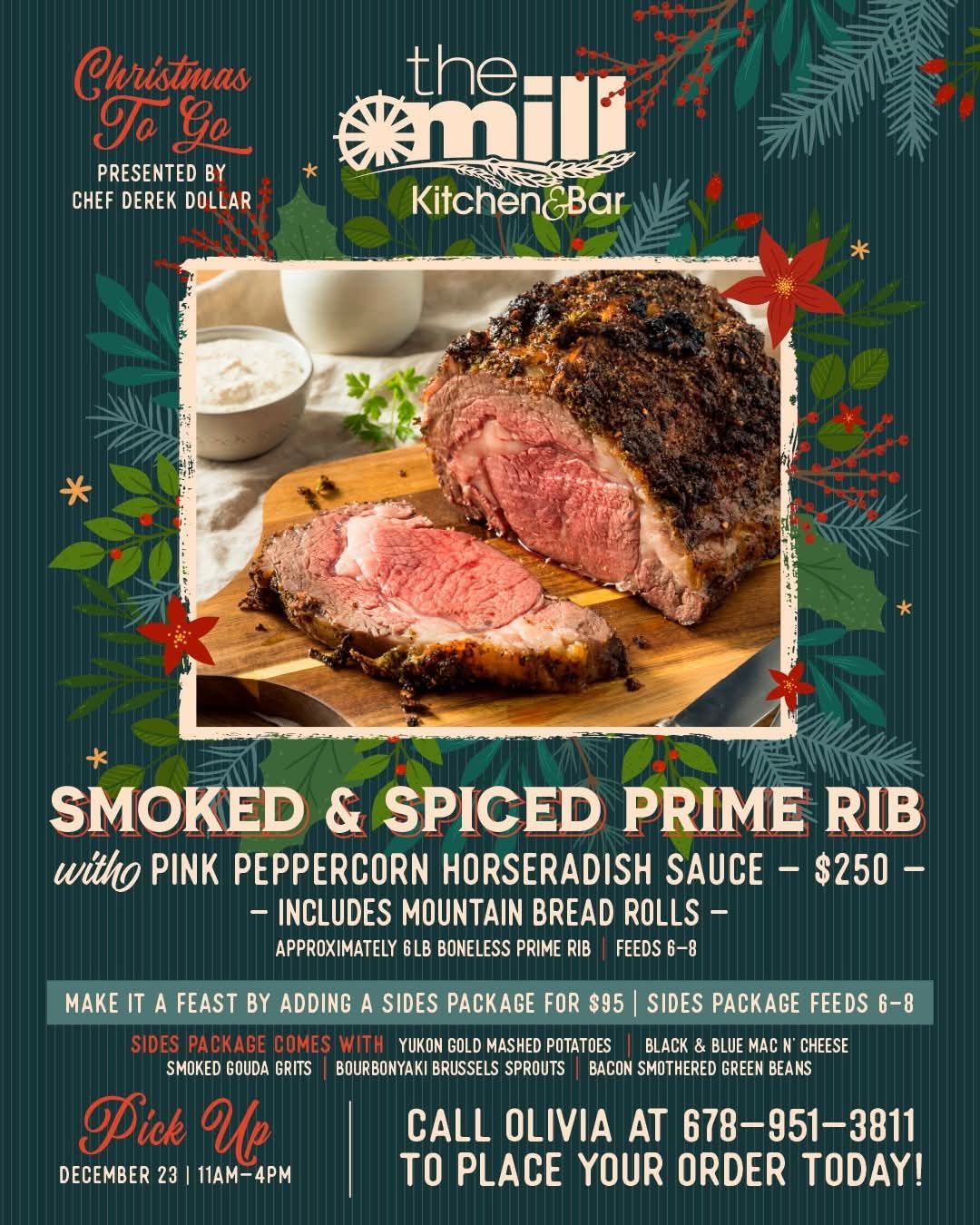 There is a bottle of champagne in a bucket on the table.