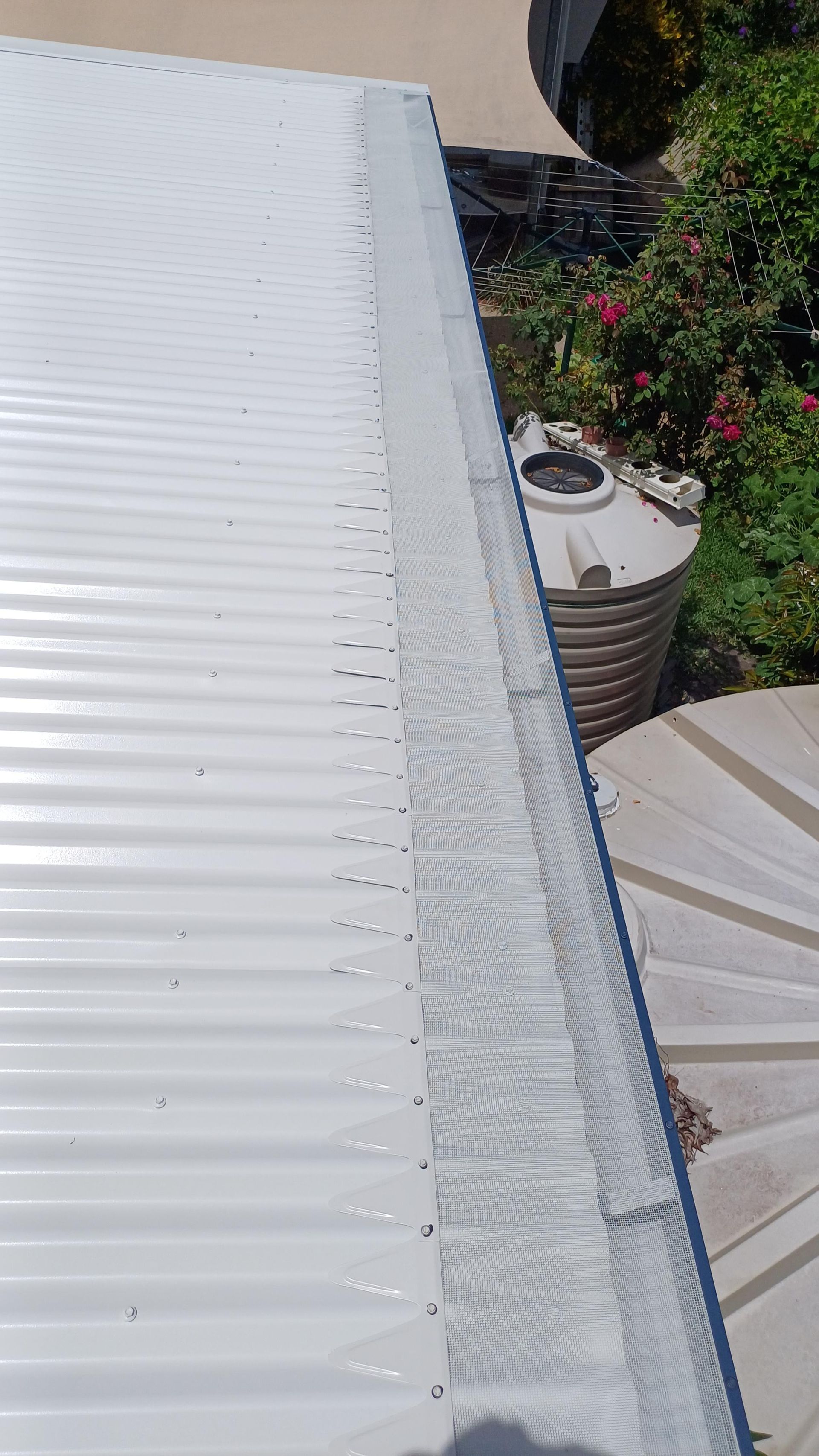 A White Roof With A Gutter — Rooftech Roofing Services in Ballina, NSW