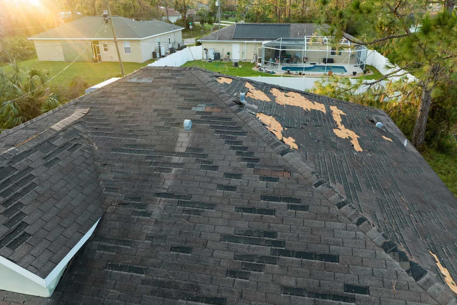 A Red Roof Is Being Installed on A House — Rooftech Roofing Services in Ballina, NSW